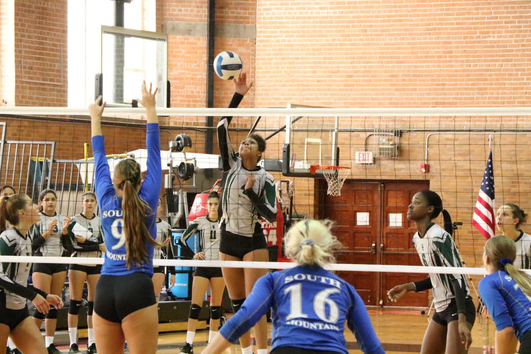 Yanlis Feliz goes up for a kill in set two, versus South Mountain Community College